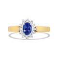 14K yellow gold ring with oval blue tanzanite and round diamond halo stones
