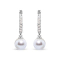 10K white gold drop earring with pearl and 1 pear diamond stone
