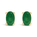 14K gold ring with oval gemstone in a low-profile setting