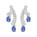 14K white gold drop earrings with oval tanzanite and diamond stones