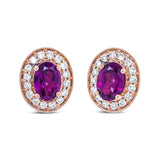 14K rose gold earrings with oval garnet and round diamond halo stones thumbnail 1