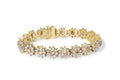 14K yellow gold bracelet with champagne diamond floral cluster halo links