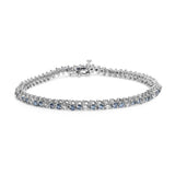 14K white gold bracelet with white and treated blue diamond stones thumbnail 1