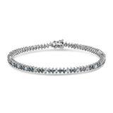 14K white gold bracelet with round white and blue diamond stones thumbnail 1