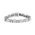 14K white gold tennis bracelet with princess cut diamond stones in invisible setting