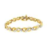10K yellow gold infinity bracelet with round diamond stones, 1.00 cttw thumbnail 1