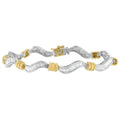 10K two-tone gold bracelet with baguette diamond stones in a spiral link design