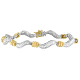 10K two-tone gold bracelet with baguette diamond stones in a spiral link design thumbnail 1