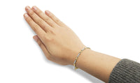 10k Yellow Gold 1/3 Cttw Diamond 3 Stone and X-Link Bracelet (I-J Color, I1-I2 Clarity) - 7.50
