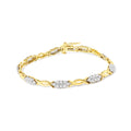 10K yellow gold spiral-link bracelet with round diamond stones, 7 inch