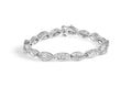 14K white gold bracelet with pear diamond swirl and link design