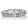 14K white gold bracelet with round diamond stones in S wave design