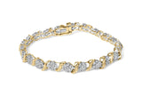 10K yellow gold bracelet with round diamond stones in an 'S' cluster thumbnail 1