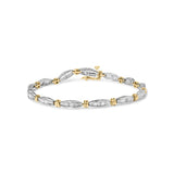 10K two-tone gold bracelet with baguette diamond stones in channel setting thumbnail 1