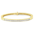 14K yellow gold bracelet with alternating princess and baguette diamond stones