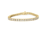 10K yellow gold tennis bracelet with round diamond stones channel set thumbnail 1