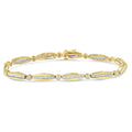 14K yellow gold bracelet with round and baguette diamond stones