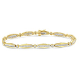 14K yellow gold bracelet with round and baguette diamond stones thumbnail 1