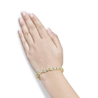 14K Yellow Gold 8 1/5 Cttw Baguette and Princess-Cut Diamond Geometric Twist Link Bracelet (G-H Color, VS1-VS2 Clarity) - Size 7