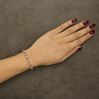 10K Rose Gold 1/2 cttw Diamond Cluster and Infinity Weave Link Bracelet (H-I Color, I2-I3 Clarity) - Size 7