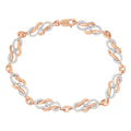 10K rose gold bracelet with round diamond stones in infinity loop and swirl links