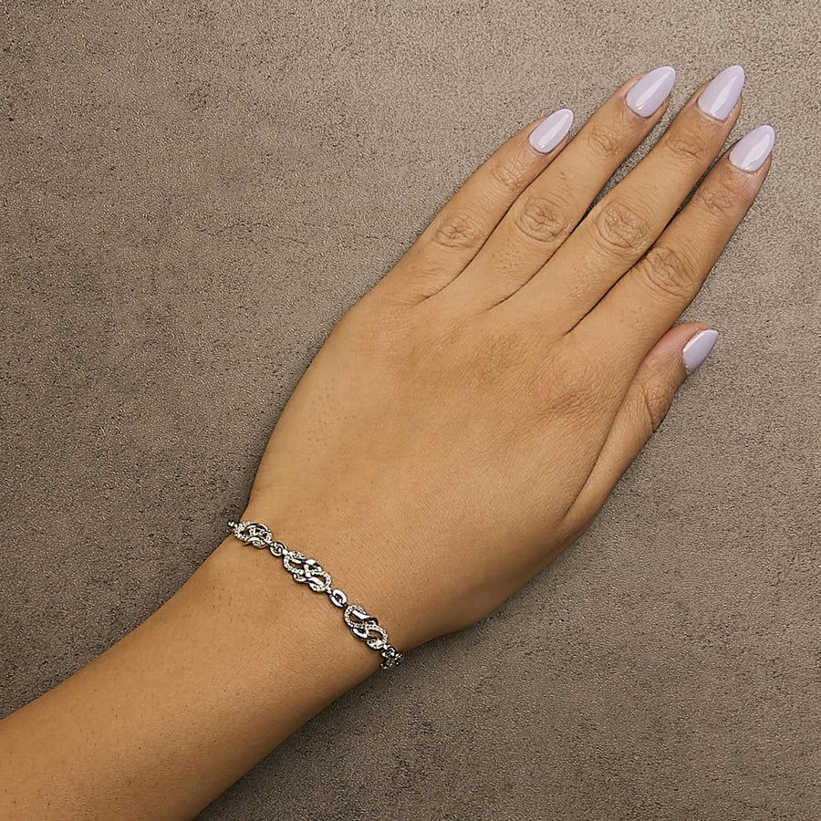 .925 Sterling Silver 1.0 Cttw Diamond Infinity Loop and Swirl Link Bracelet (I-J Color, I2-I3 Clarity) - 7.25