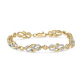 14K yellow gold bracelet with 1.0 ctw diamonds on infinity loop and swirl links