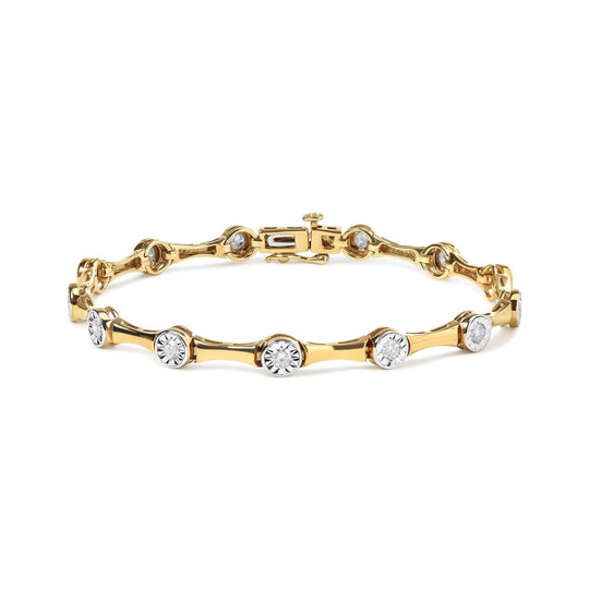 10K yellow gold bracelet with bezel-set round diamond stations