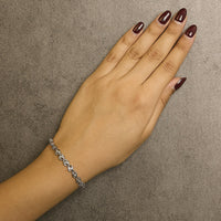 .925 Sterling Silver 1/10 Cttw Round-Cut Diamond Links of Flame Bracelet (I-J Color, I3) - 7.25
