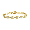 10K yellow gold bracelet with round diamond stones in prong settings