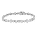 10K white gold bracelet with round and baguette diamond floral clusters