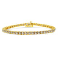 14K yellow gold plated bracelet with round diamond stones in a classic tennis link row