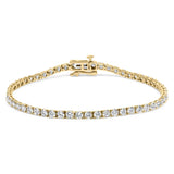 14K gold tennis bracelet with a line of round diamond stones thumbnail 1