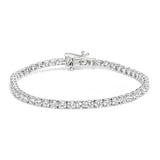 14K white gold tennis bracelet with round diamond stones in prong settings thumbnail 1
