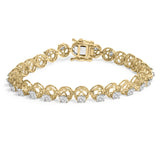14K yellow gold tennis bracelet with round diamond stones in buttercup settings thumbnail 1