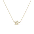 10K yellow gold leaf and branch necklace with diamond accents on 18-inch chain
