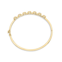 14K Yellow Gold Alternating Bezel Set 5MM Oval Shaped Tanzanite and 1/5 Cttw Diamond Bangle Bracelet (H-I Color, VS2-SI1 Clarity) - Fit's wrists up to 7.25