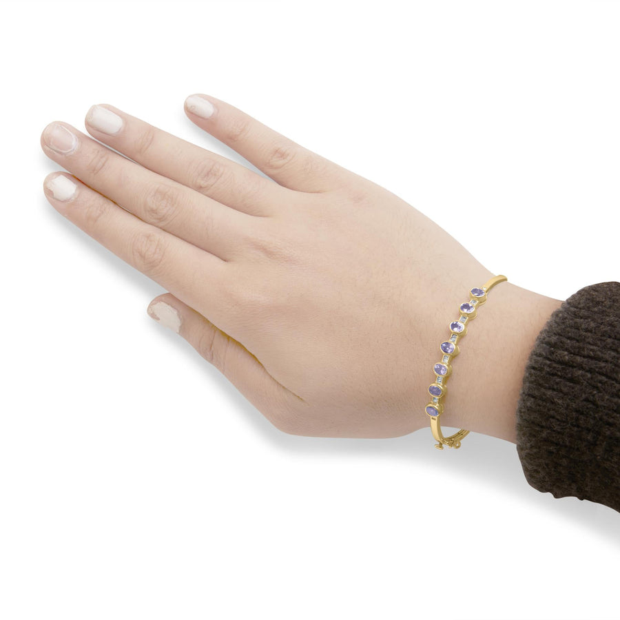 14K Yellow Gold Alternating Bezel Set 5MM Oval Shaped Tanzanite and 1/5 Cttw Diamond Bangle Bracelet (H-I Color, VS2-SI1 Clarity) - Fit's wrists up to 7.25