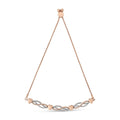 14K rose gold bracelet with heart diamond accents on infinity link chain