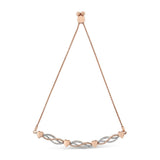 14K rose gold bracelet with heart diamond accents on infinity link chain thumbnail 1
