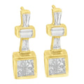 14K yellow gold hoop earrings with round diamond stones in a lined setting