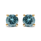 14K gold stud earrings with 2 round aqua blue diamond stones thumbnail 1