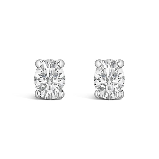14K white gold stud earrings with 2 oval diamond stones