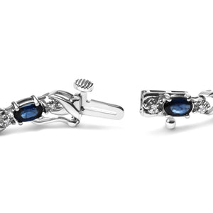 10K White Gold 5x4mm Oval Sapphire Gemstone and 1/10 Cttw Diamond Prong Set 