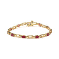 10K yellow gold bracelet with oval ruby and round diamond stones
