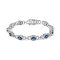 14K white gold bracelet with oval blue sapphire and diamond stones