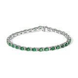 14K white gold bracelet with alternating oval emerald and diamond stones thumbnail 1