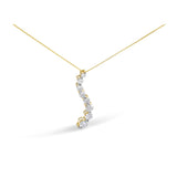 14K yellow gold necklace with baguette and round diamond journey pendant thumbnail 1