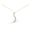 14K yellow gold necklace with baguette and round diamond journey pendant