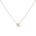 10K gold necklace with 1 round diamond stone in a bezel setting